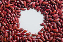 Red Kidney Beans With Isolated White Circle Space Background.