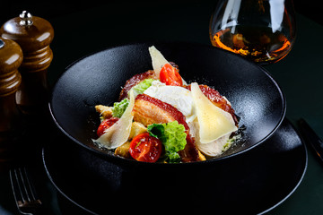 Wall Mural - Delicious Ceasar salad with tomatoes bacon and poached egg