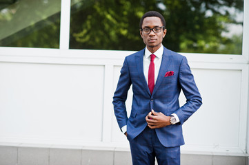 African american happy successful man at suit and glasses. Black business man.