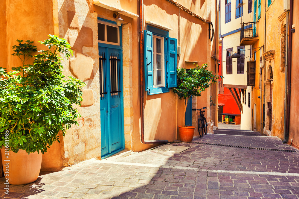Beautiful cozy street in Chania, Crete island, Greece. - obrazy, fototapety, plakaty 