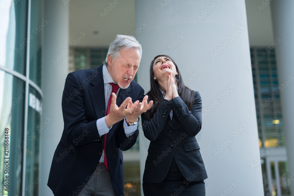 Angry and desperate business people arguing with each other