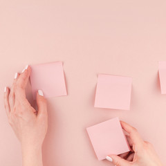 Wall Mural - Woman hands with paper stickers