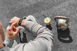 © Maridav - Gym fitness strength training fit man using sport watch smartwatch touchscreen at kettlebell weight lifting workout. green smoothie athlete healthy fitness lifestyle.