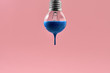 © Andriy Bezuglov - Bulb with blue paint on it