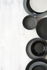 Poster - Monochrome tableware on white wood