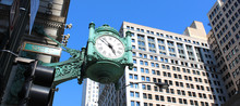 Chicago - Clock At The Corner Of State And Washington