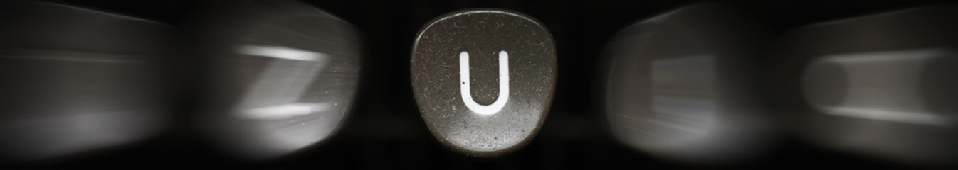 Fototapete - The letter of the alphabet in English U