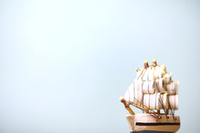 Old Wooden Ship With Sails And Masts Toy On A Stand. Vintage And