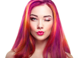 Wall Mural - Beauty Fashion Model Girl with Colorful Dyed Hair. Girl with perfect Makeup and Hairstyle. Model with perfect Healthy Dyed Hair. Rainbow Hairstyles