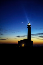 Sea Lighthouse With The Moon