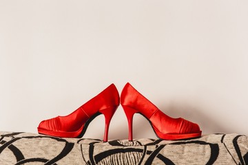 Wedding shoes on their wedding isolated in a room