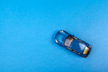 Blue Toy Car On Blue Colored Background