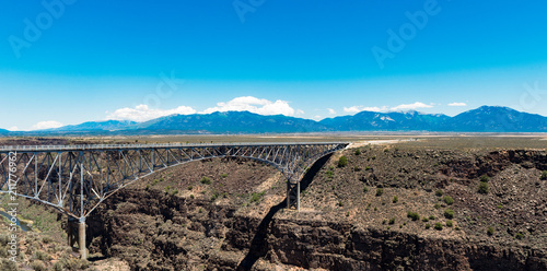 Rio Grande Gorge Bridge Near Taos New Mexico Mountains And Blue Skies Stock Photo Adobe Stock Rio Grande Gorge Bridge Near Taos New Mexico Mountains And Blue Skies Stock Photo Adobe Stock
