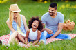 © NDABCREATIVITY - Picture of lovely couple with their daughter having picnic