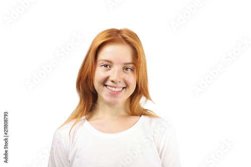 Beautiful Redheaded Young Woman With Satisfied Facial Expression