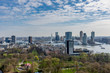Panoramic cityscape of Rotterdam with park in the foreground