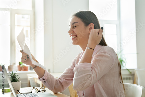 Fotomural Happy female worker excited getting business letter with promotion news, satisfied woman celebrating corporate success reading report with great result or personal achievement