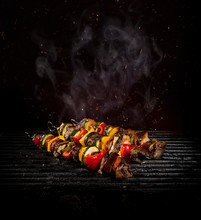 Chicken Skewers On The Grill With Flames