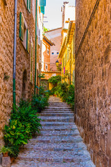 A narrow street in the spanish village Fornalutx at Mallorca