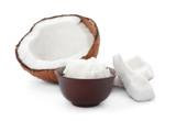 Fototapeta Uliczki - Ripe coconut and bowl with oil on white background. Healthy cooking
