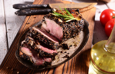 Wall Mural - Baked pork ham with herbs