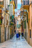 Fototapeta Uliczki - View of a narrow street in the historical center of Palma de Mallorca, Spain