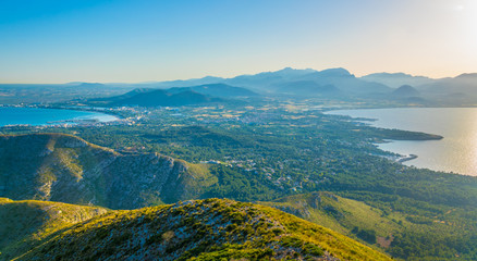 Poster - Sunset aerial view of Alcudia town situated between Pollenca and Alcudia bays, Mallorca, Spain