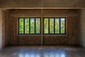 Antique wooden window with the old brick wall in classic room