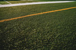 © Ryan - Turf Field with Yellow and White Lines Close Up