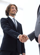 © ASDF - Closeup of a business handshake