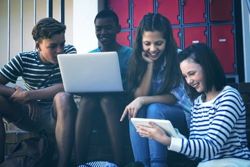 Poster - Students using laptop, mobile phone and digital tablet on