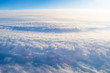 Overcast cloud cloudscape with height flight level of the airplane, smooth uniform texture of white steam before of the sunset.