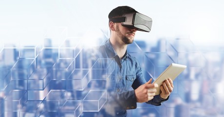 Poster - Man using tablet with virtual reality headset with geometric