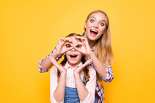 Joke Positive Emotion Face Facial Expression Adventure Look Health Care Concept. Portrait Of Two Funky Amazed Shocked Cute Girls Fooling Around Making Eyeglasses With Hands Isolated Bright Background