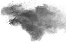 Black Powder Explosion Against White Background.Closeup Of Black Dust Particles Explode Isolated On White Background.