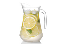 Homemade Lemonade With Mint And Ice With A Glass Jug On A White Background. Isolated