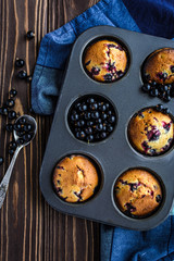 Homemade delicious muffins with fresh berries 