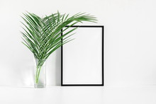 Front View Blank Mock Up Of Photo Frame On White Background, Tropical Palm Leaves. Summer Concept. Flat Lay, Top View, Copy Space 