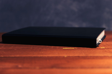 Aufkleber - Daily planner on a red wooden table.