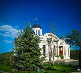 Wall Mural - Exterior view to winter church in Curchi orthodox monastery, Orhei, Moldova