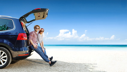 Poster - Summer trip on beach. Big blue car with two people. Free space for your text. 