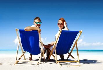 Canvas Print - Summer trip on beach and two lovers. 