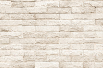 Wall Mural - Cream and white brick wall texture background. Brickwork or stonework flooring interior rock old pattern clean concrete grid uneven bricks design stack.