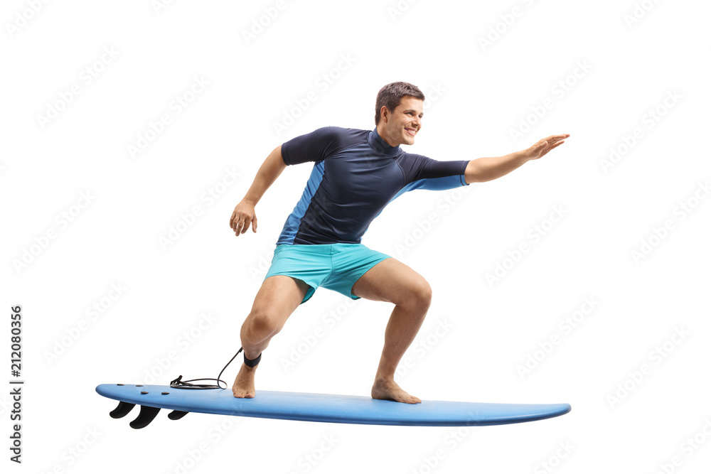 Surfer surfing on a surfboard - obrazy, fototapety, plakaty 