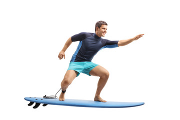 Canvas Print - Surfer surfing on a surfboard