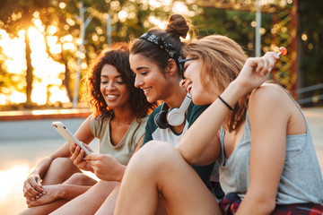 Canvas Print - Three excited young girls having fun