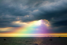 Rainbow Back Dark Cloud On Sea. Concept God Bless, Wish