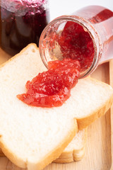 Wall Mural - Toast sandwiches with strawberry jam isolated on white background, top view