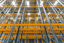 Wide View Metalic Scaffolding With Yellow Bars Inside The Building