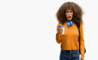 Canvas Print - African american student woman scared in shock, expressing panic and fear